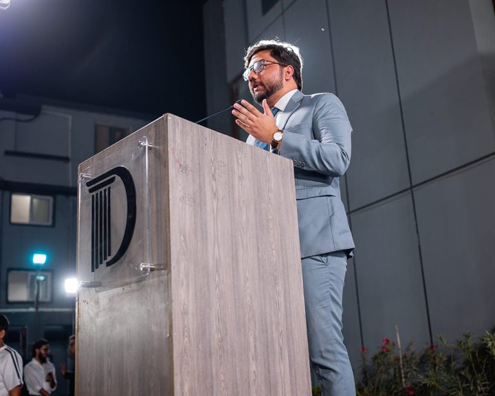 Portrait of Hamza Sayyed, law lecturer and debate coach at MUN Society Pakistan.