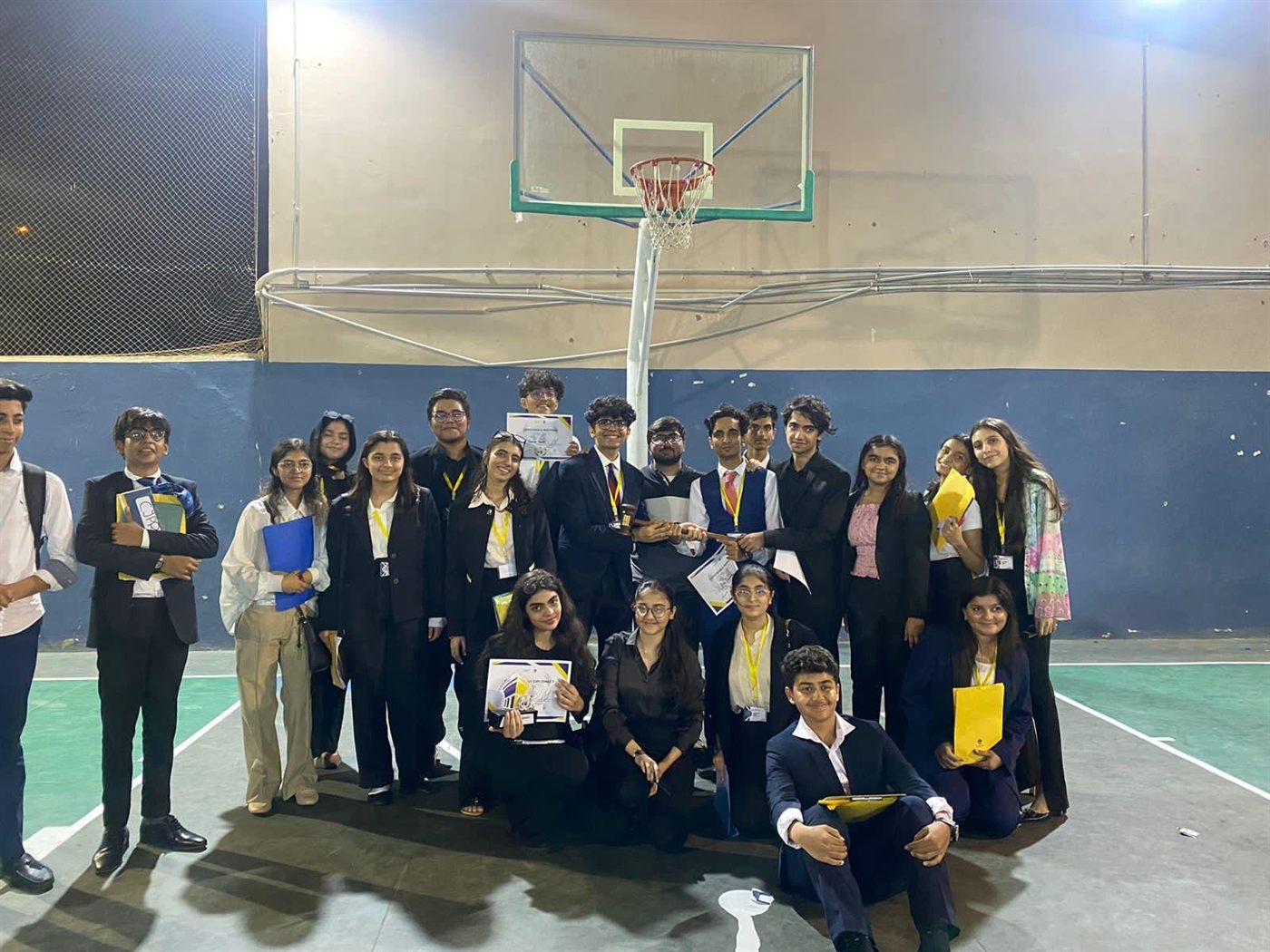 An MUN Society Pakistan delegation group photograph at a Model United Nations conference.