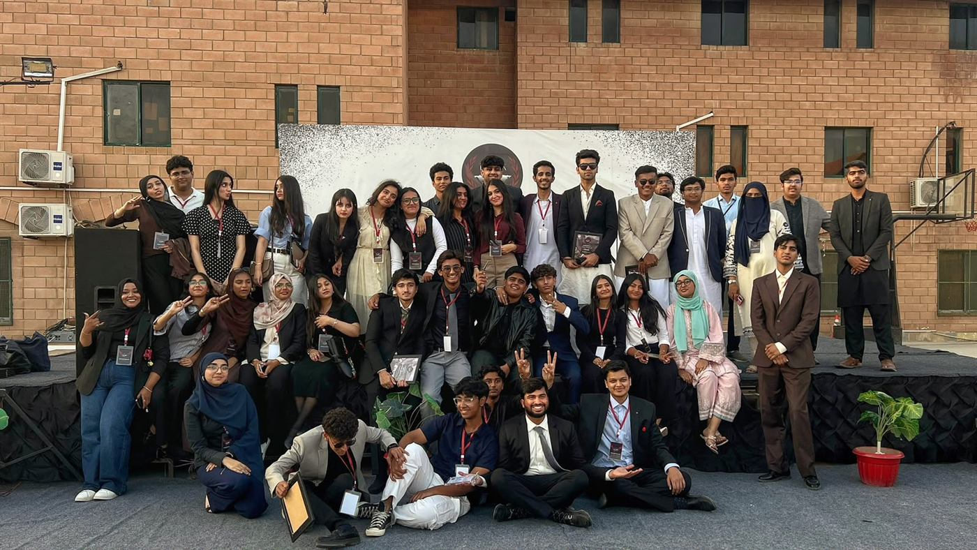 A candid photograph of the MUN Society Pakistan team at PAFMUN.